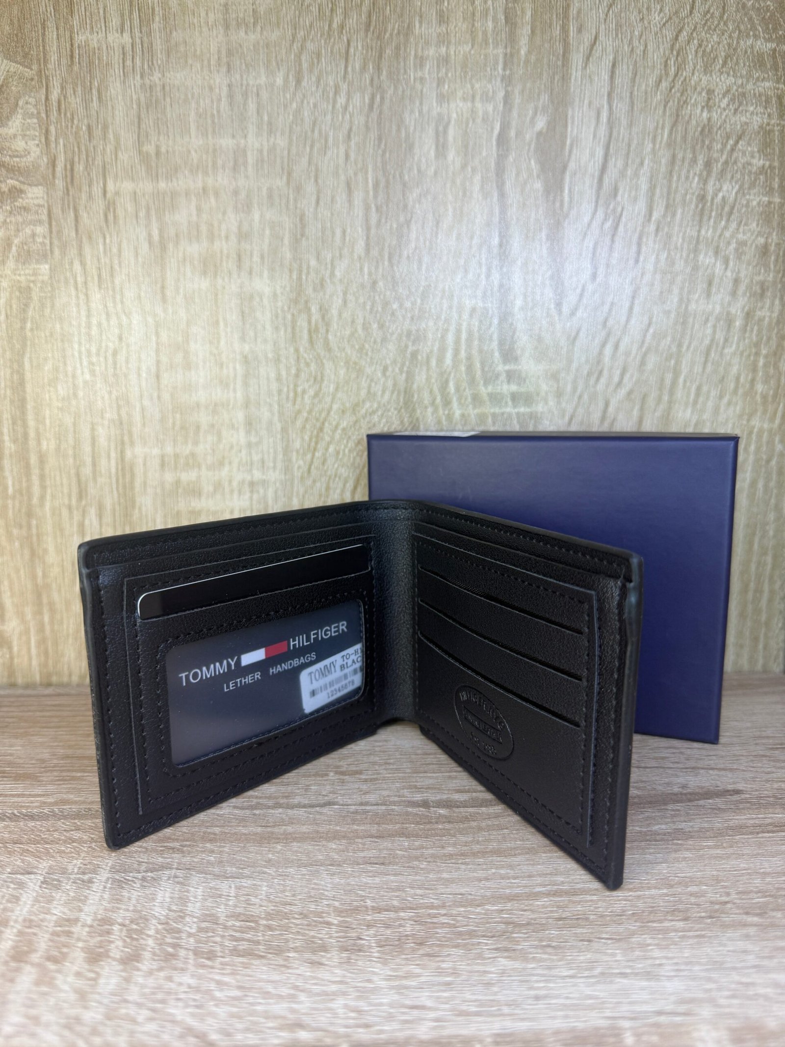 PORTE MONNAIE HOMMES TOMMY 1